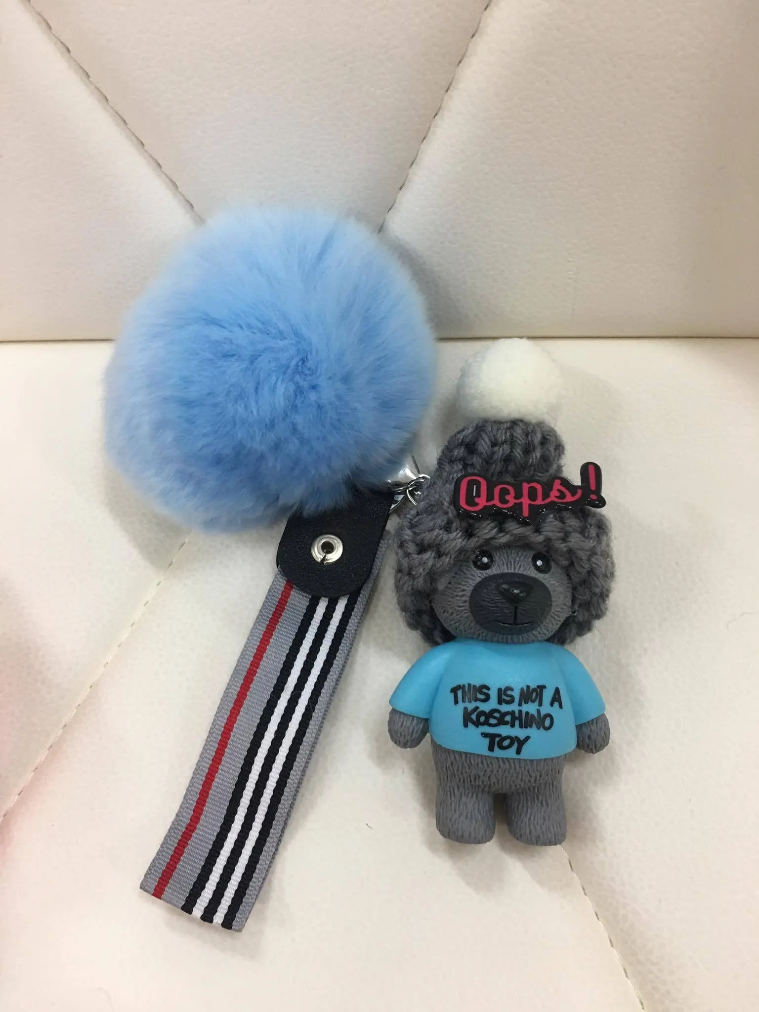 Beanie bear with fur ball bag charm