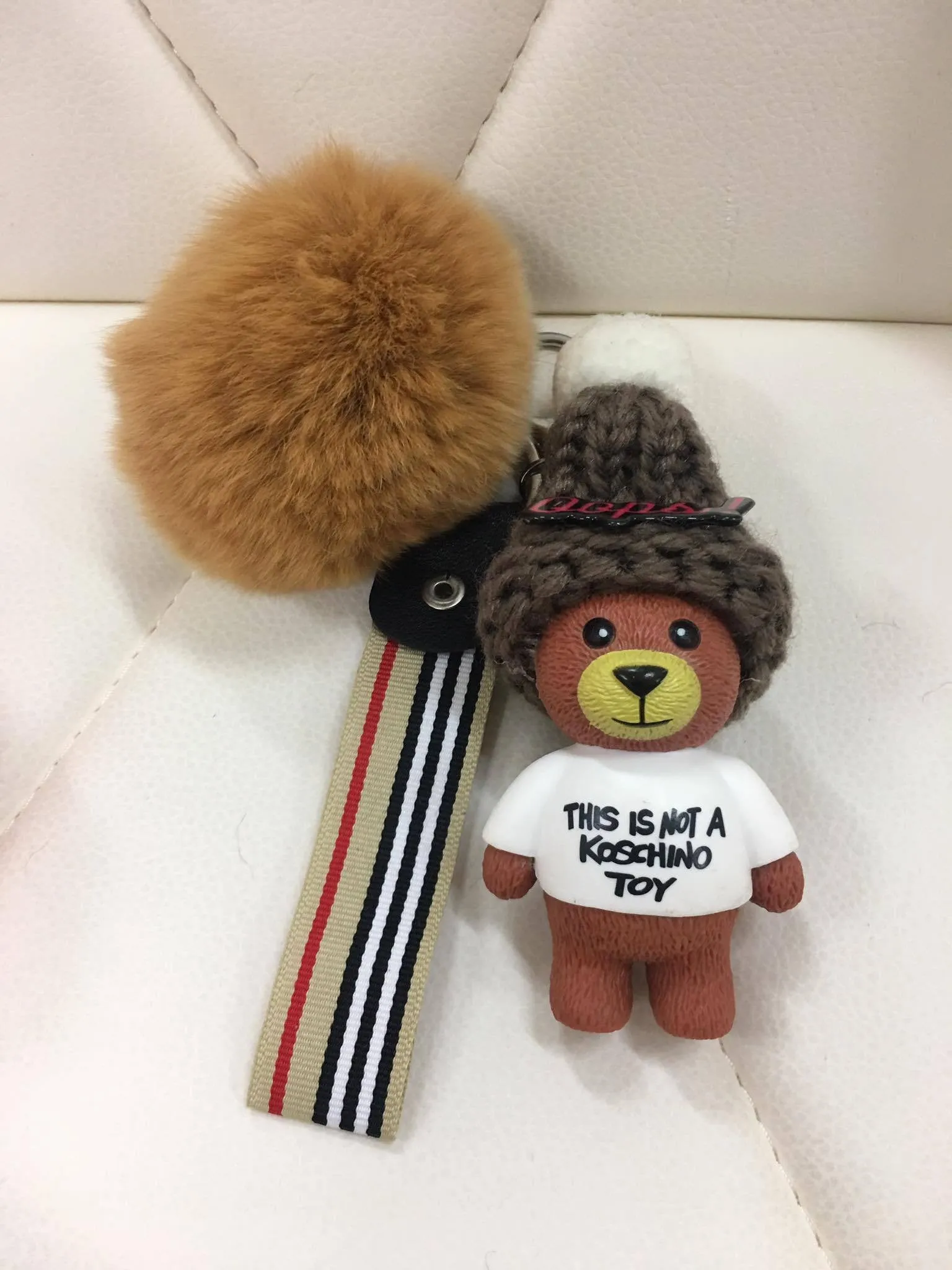 Beanie bear with fur ball bag charm