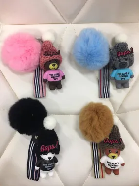 Beanie bear with fur ball bag charm