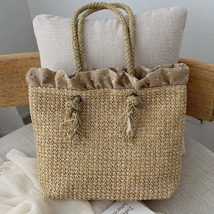 Eco-Friendly Woven Straw Bucket Style Tote Bag with Braided Handler.