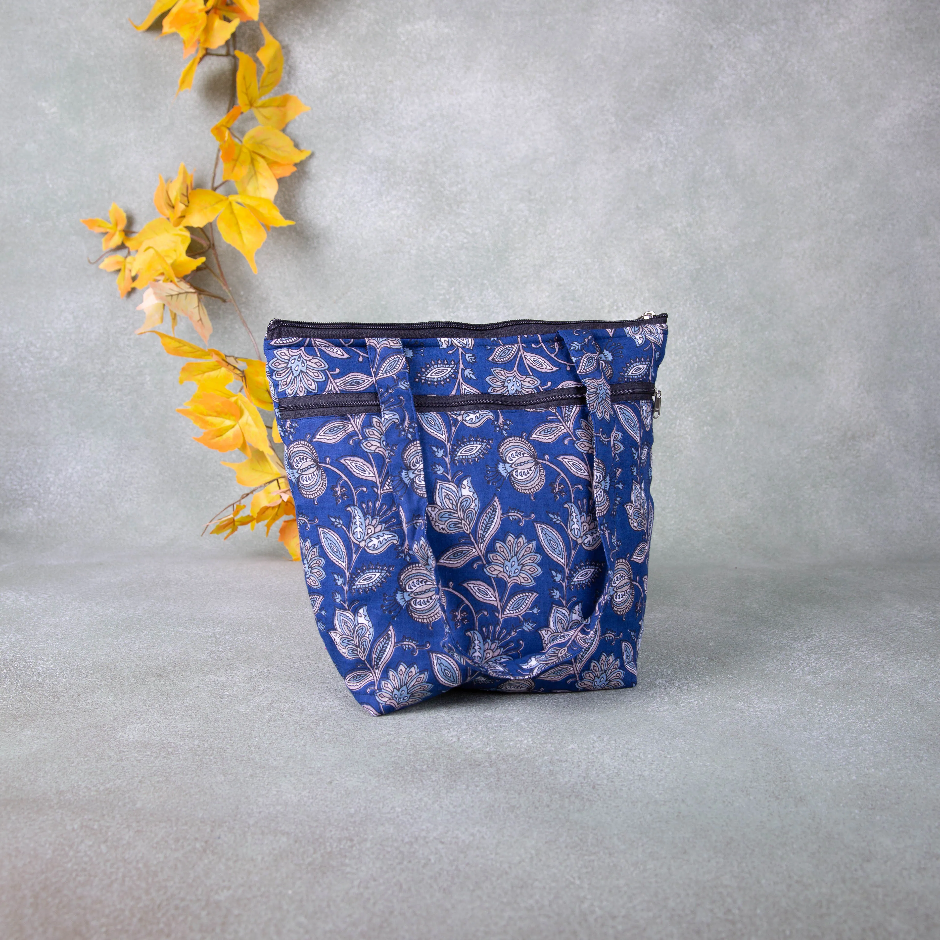 Medium Size Handbag Blue with Grey Flower Design.