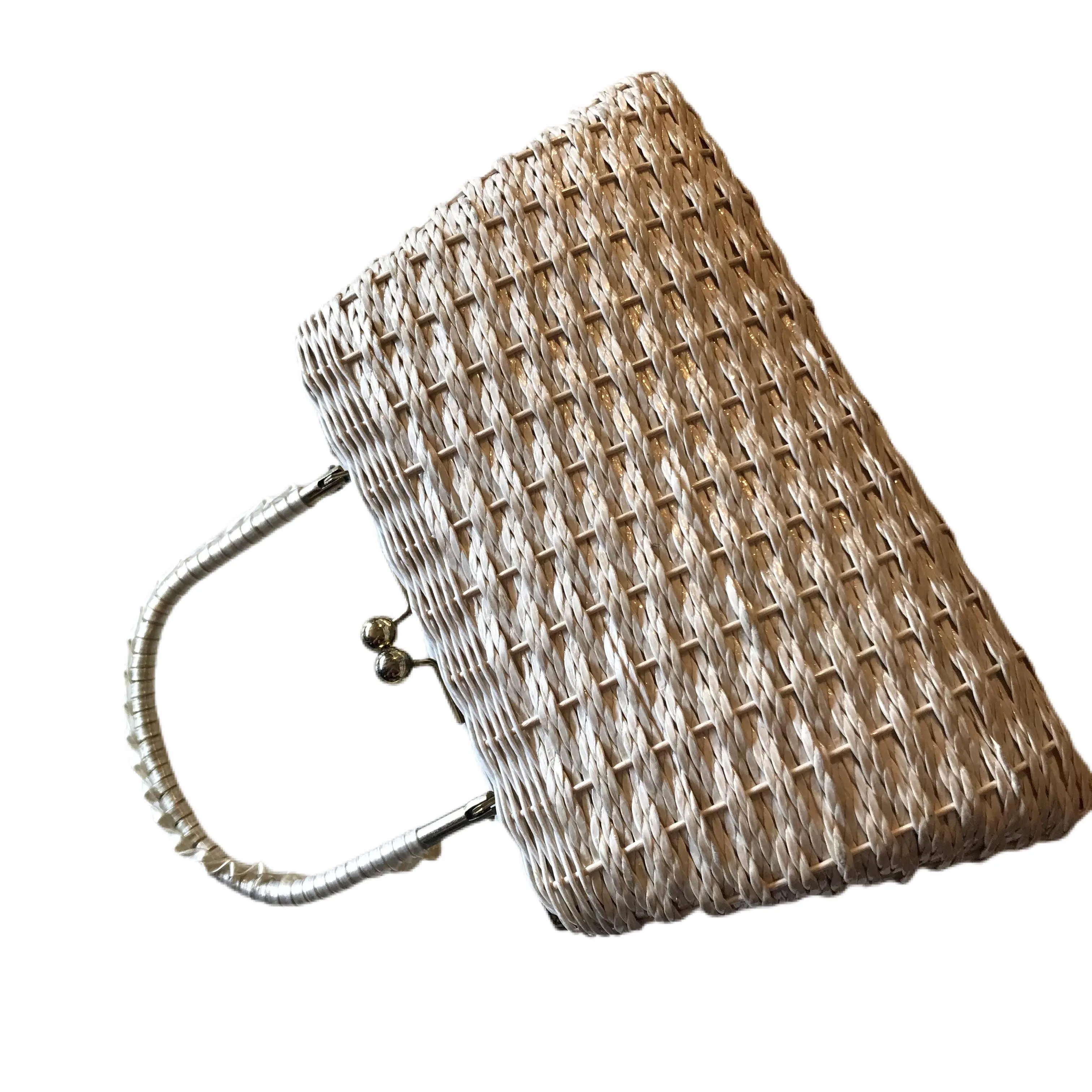 Shiny White Woven Rattan Kiss Clasp Handbag circa 1960s